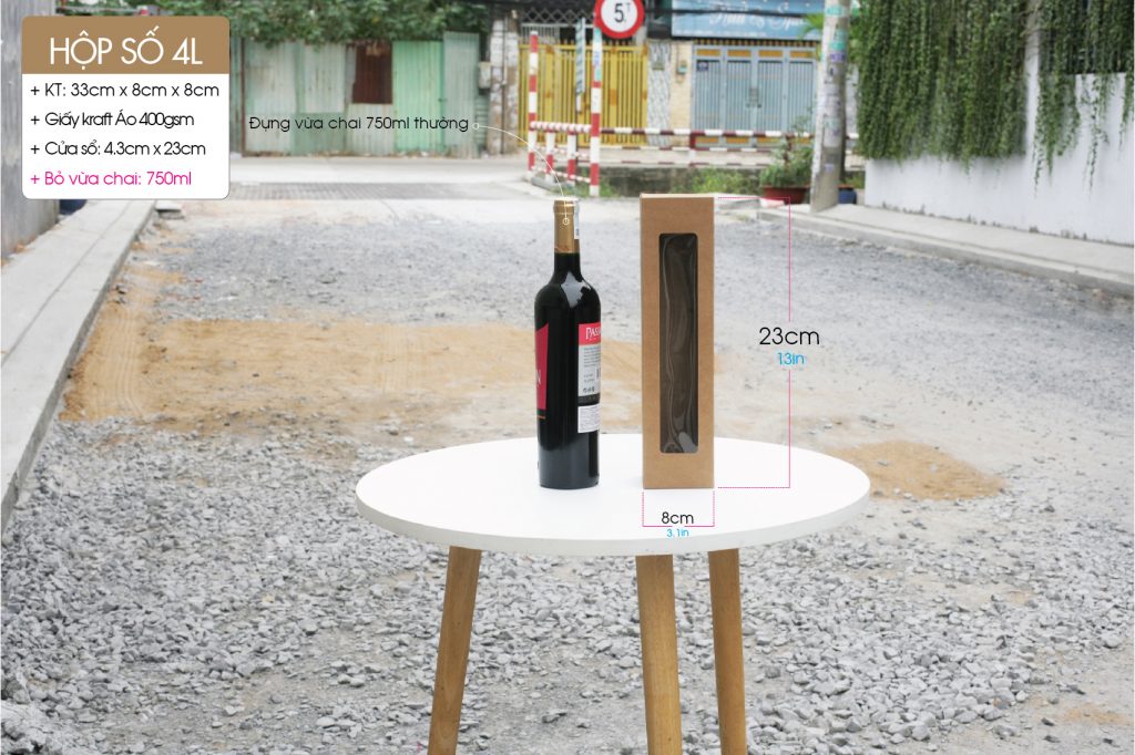 Hộp giấy đứng size L có thể đựng được chai rượu vang 750ml truyền thống.