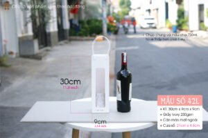Túi 42 size L với chiều cao 30cm, khi so với chai vang 750ml sẽ thấp hơn 1 xíu.
