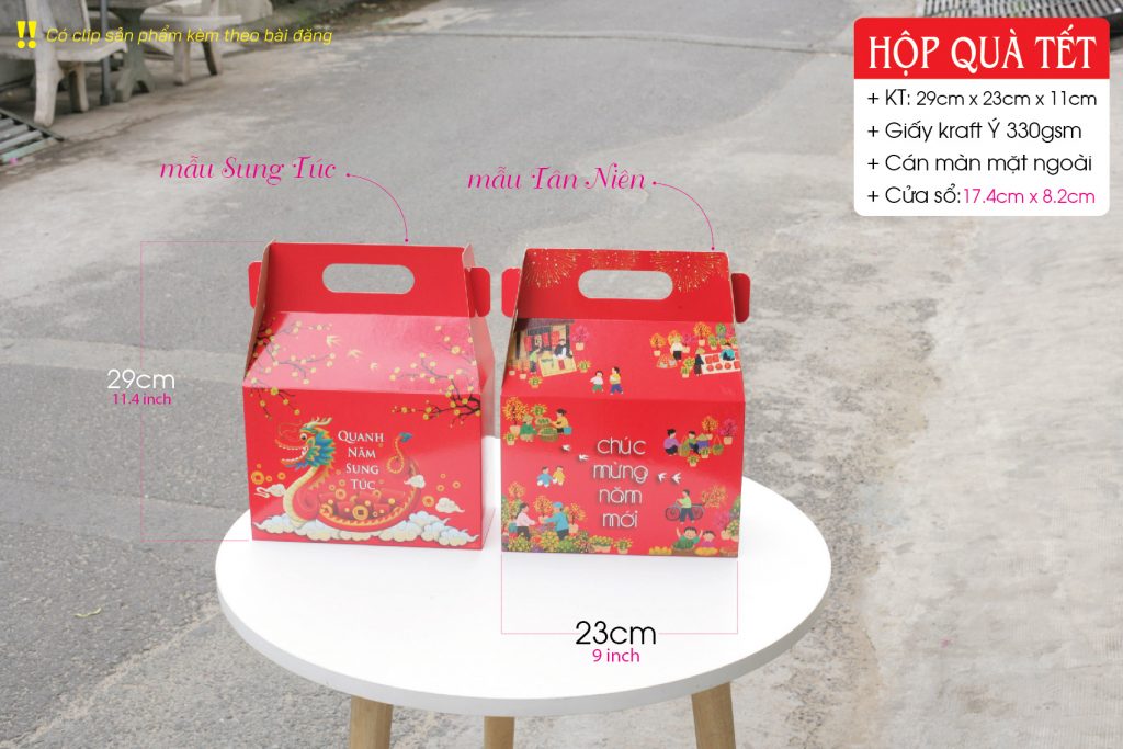Hộp giấy đựng quà dịp Tết - Lunar New Year Gift Box - được trang trí đẹp mắt và có các hoa văn, hình ảnh liên quan đến Tết như hoa mai, hoa đào, chữ "Tết" hay các biểu tượng mang ý nghĩa may mắn, sung túc.
