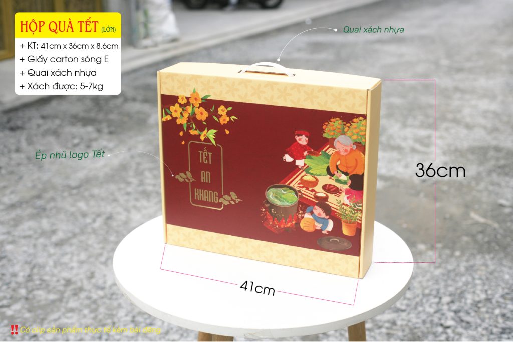 Hộp giấy đựng quà dịp Tết - Lunar New Year Gift Box - được trang trí đẹp mắt và có các hoa văn, hình ảnh liên quan đến Tết như hoa mai, hoa đào, chữ "Tết" hay các biểu tượng mang ý nghĩa may mắn, sung túc.